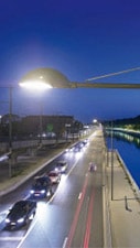 Closer look to a pole luminaire in a street illuminated with Philips white lighting