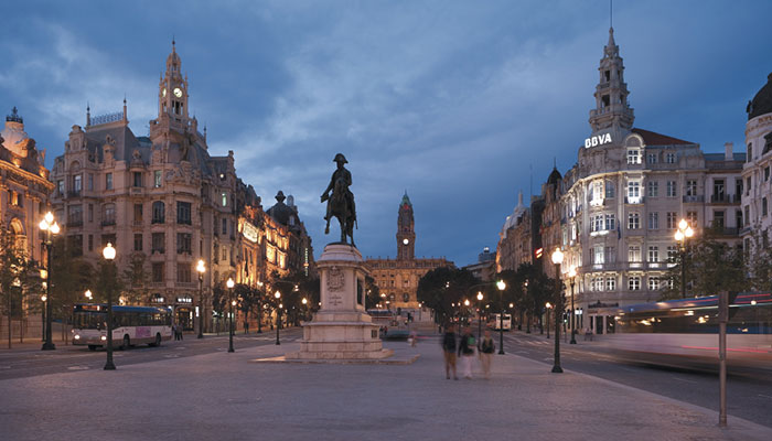 People are walking in a square well-lit with Philips white light